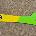HiveAlive EZ Find Pro hive tool showing the yellow and green handle and stainless steel J-hook